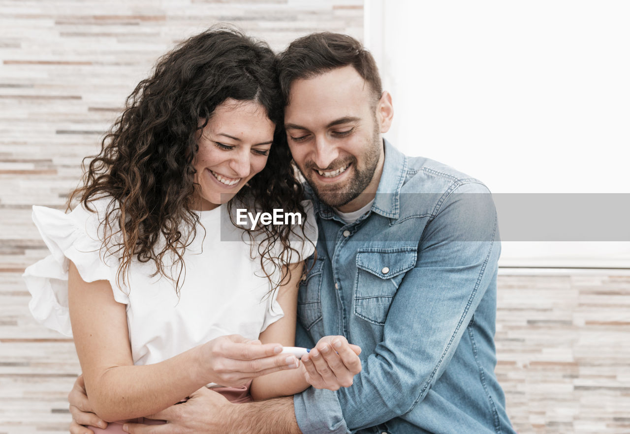 YOUNG COUPLE KISSING
