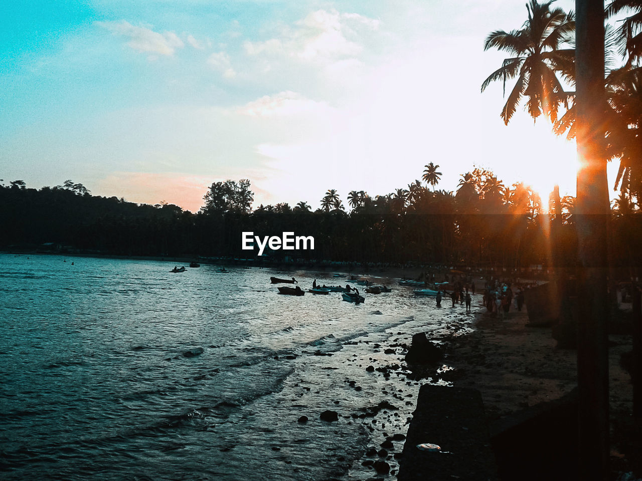 SCENIC VIEW OF SUNSET OVER LAKE