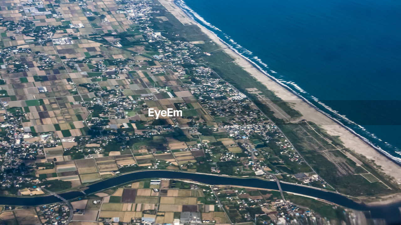 Aerial view of city against sky