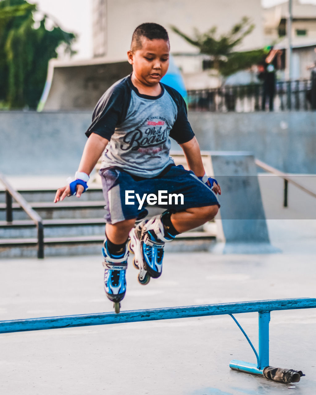 FULL LENGTH OF A BOY JUMPING ON THE WALL