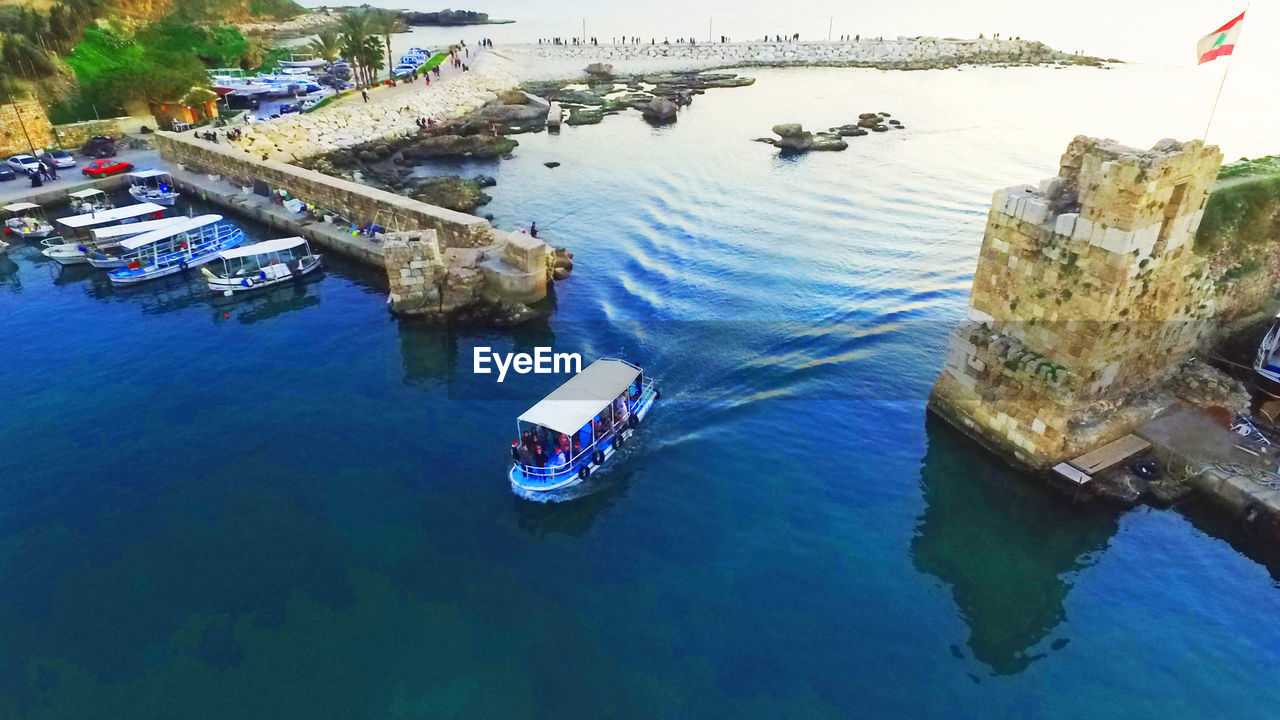 VIEW OF BOATS IN RIVER