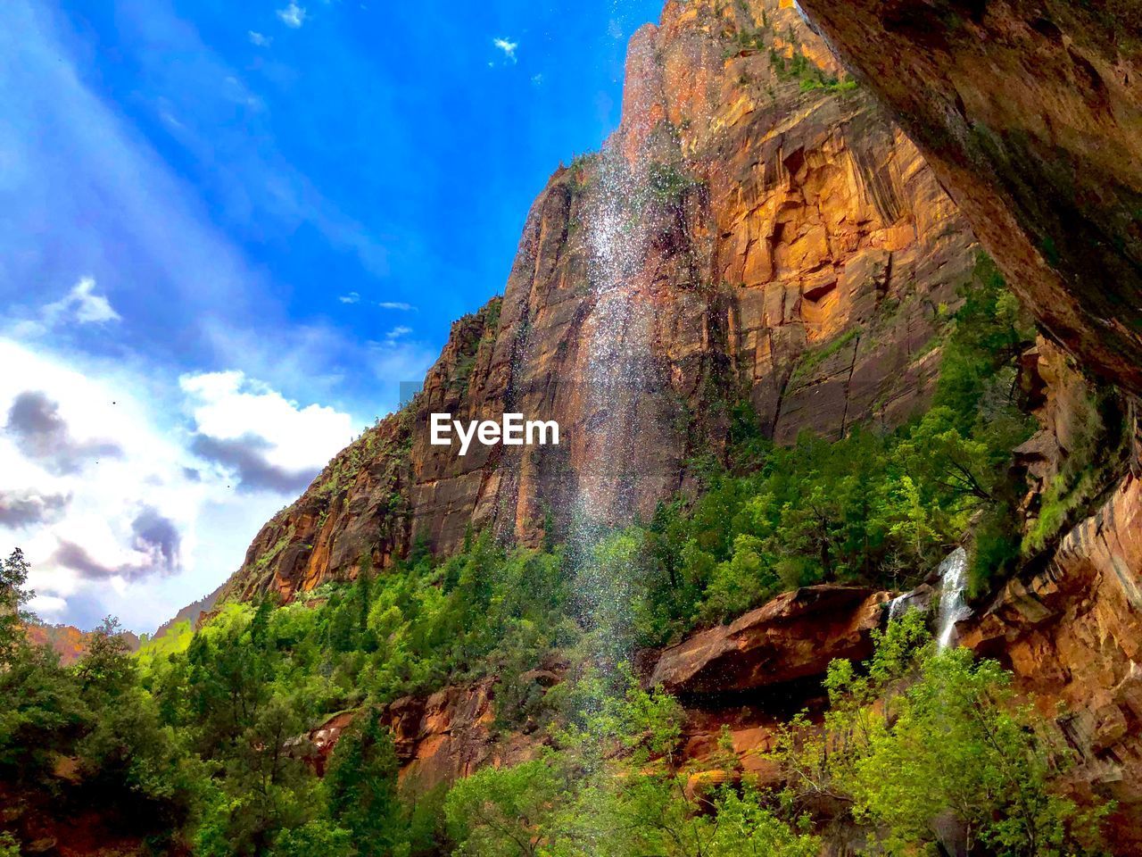 Low angle view of rocks against sky