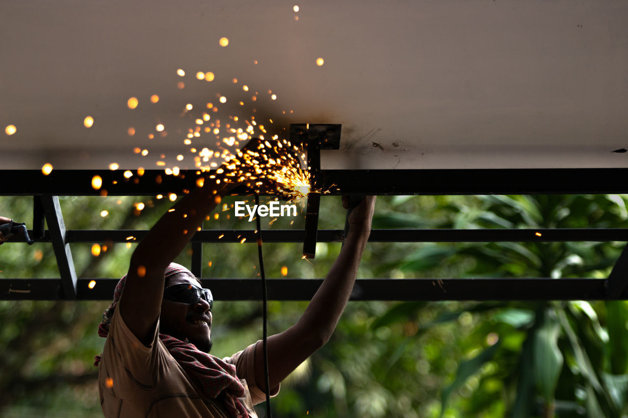 A man doing welding works  outdoor