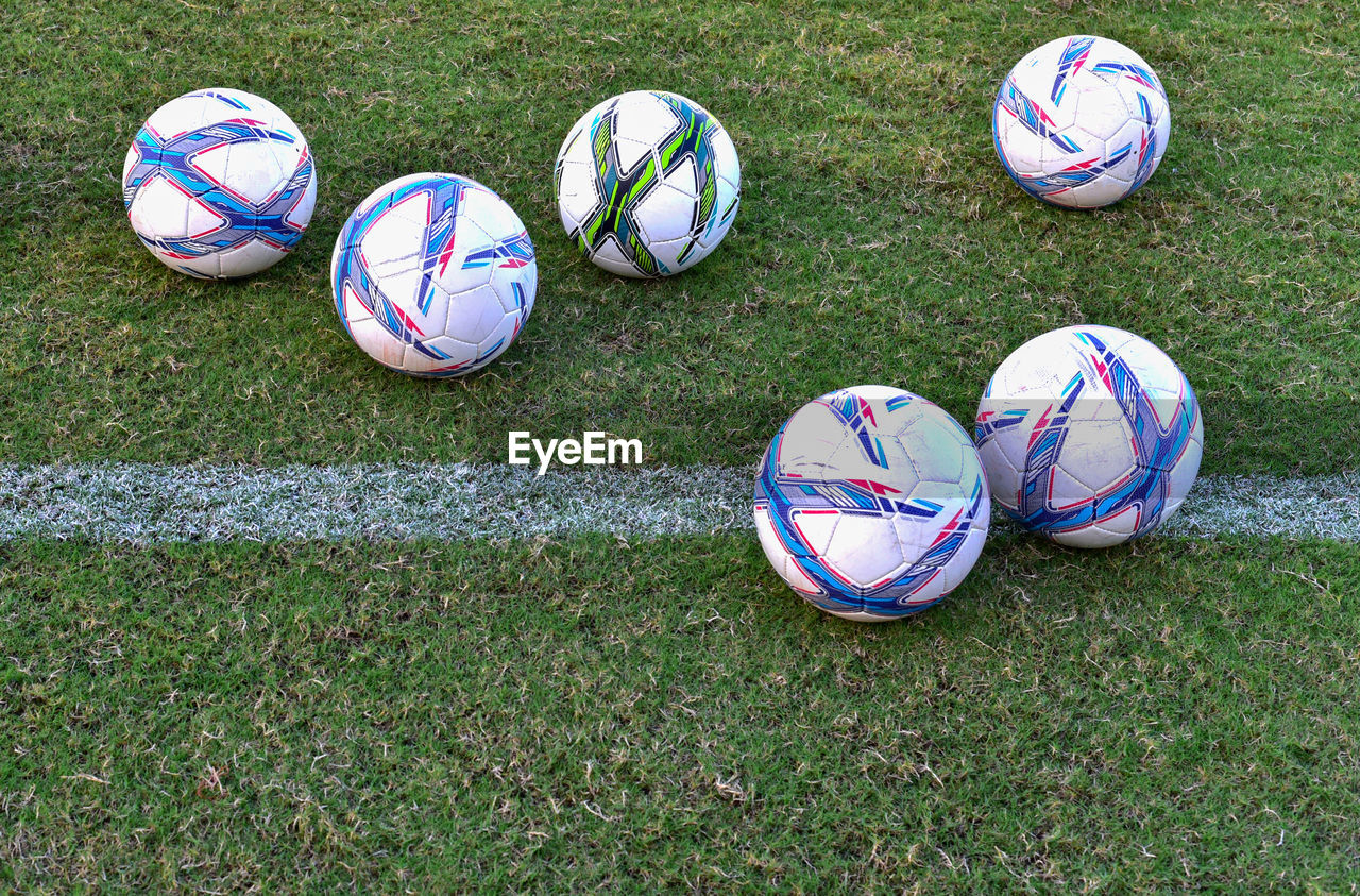 HIGH ANGLE VIEW OF BALL ON FIELD