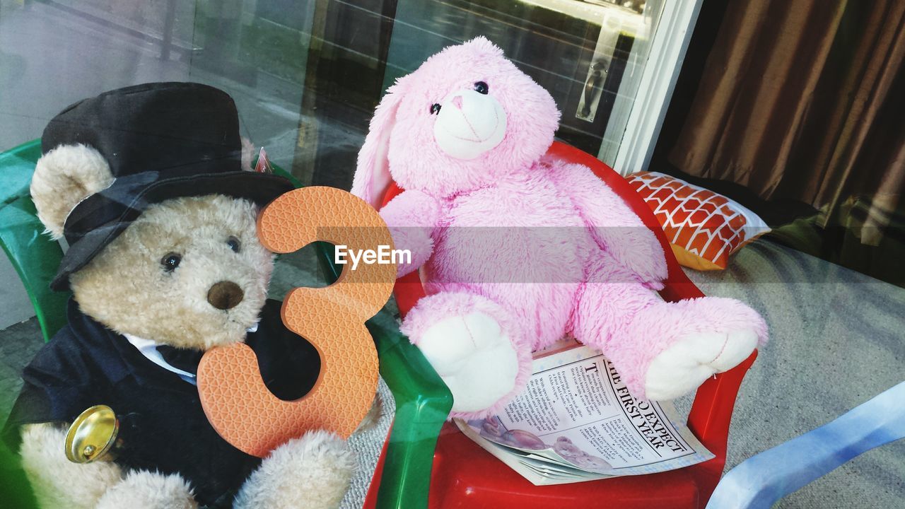 CLOSE-UP OF STUFFED TOY ON HOME