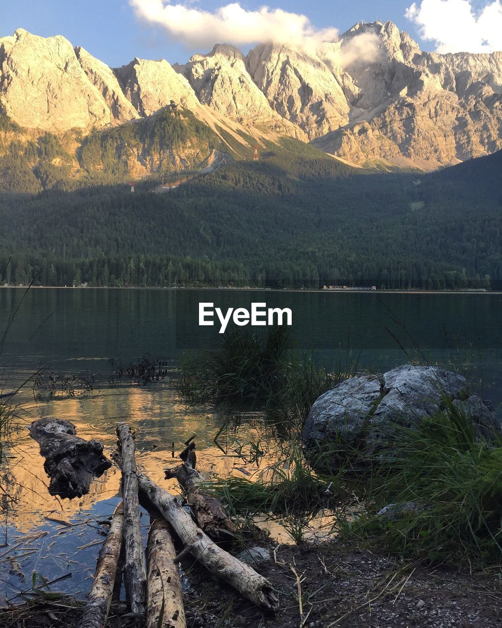 Scenic view of lake with mountains reflection