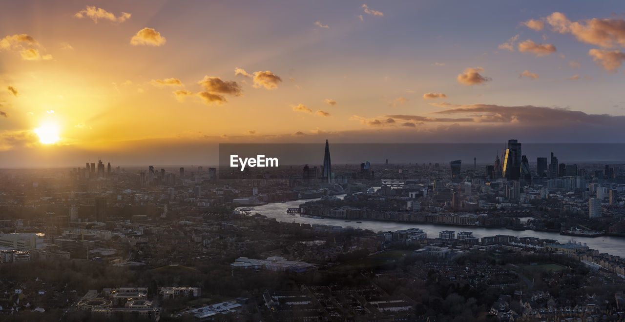 high angle view of city at sunset