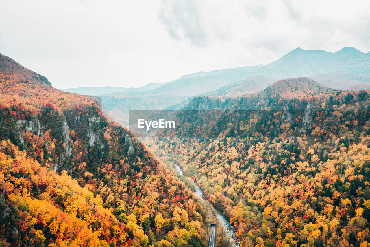 Scenic view of mountains against sky during autumn