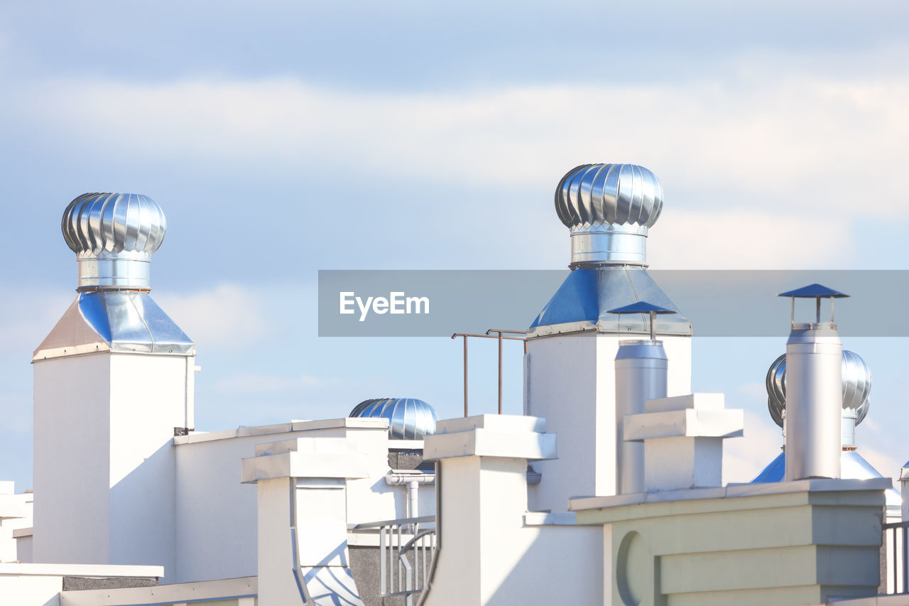 Roof extractor fans on the rooftop . mounted exhaust fan for air ventilation