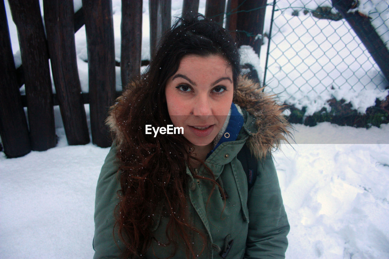 PORTRAIT OF WOMAN IN SNOW