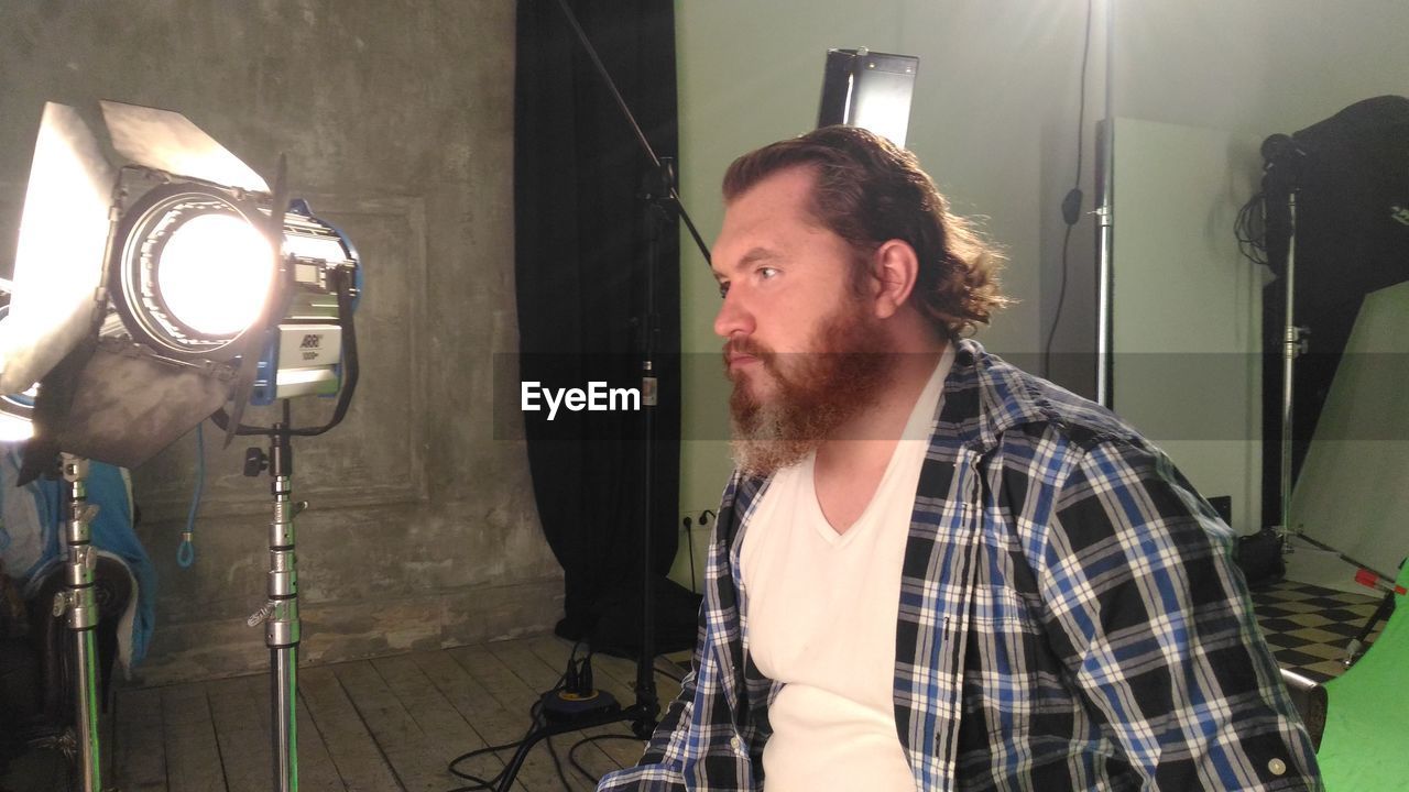 Bearded man in film studio