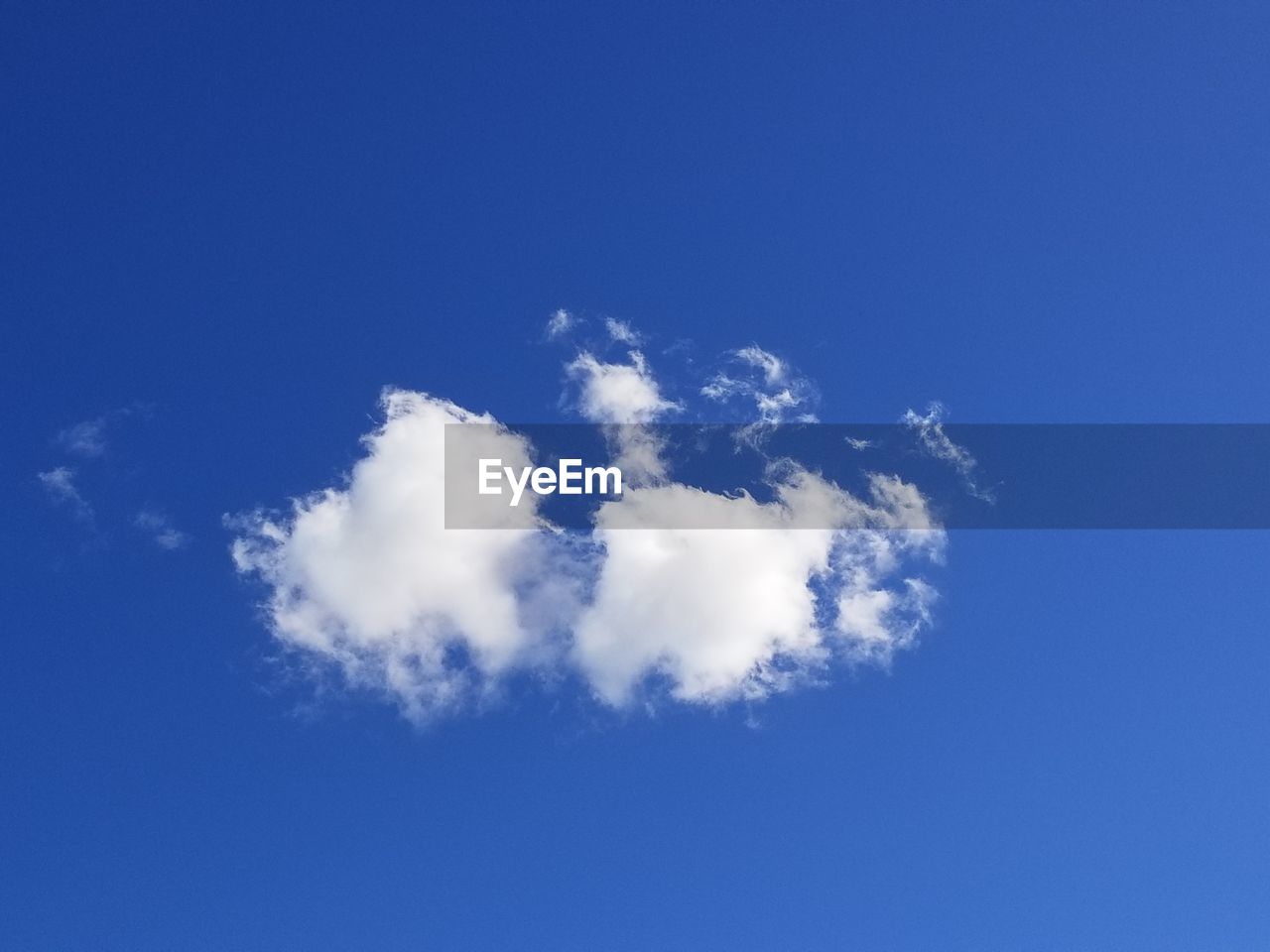 LOW ANGLE VIEW OF BLUE SKY AND CLOUDS IN CLEAR BACKGROUND
