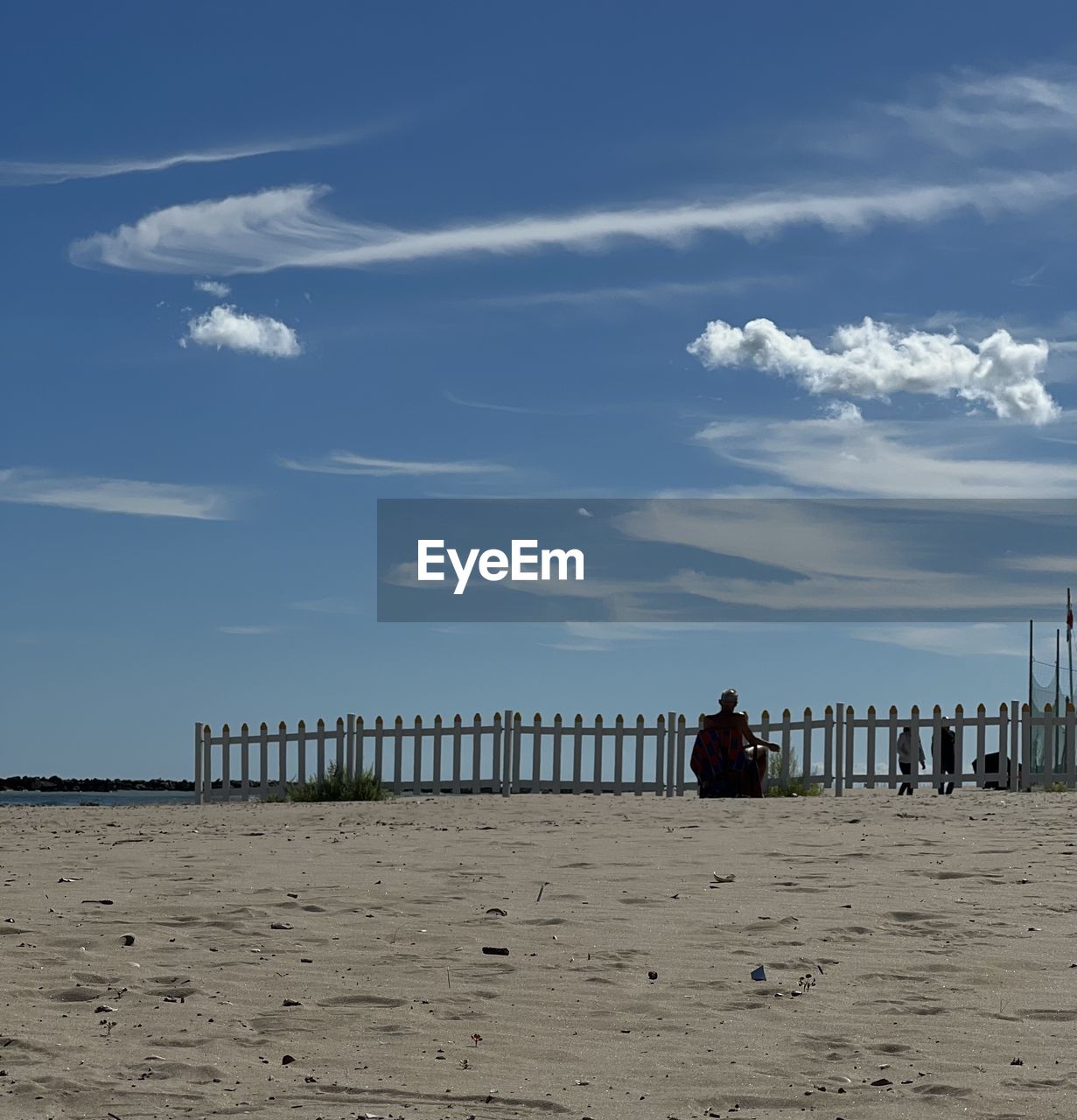 sky, horizon, beach, land, cloud, sea, sand, ocean, coast, body of water, shore, nature, water, architecture, scenics - nature, beauty in nature, day, wave, pier, built structure, outdoors, tranquility, horizon over water, men, tranquil scene, trip, holiday, vacation, blue, wood, boardwalk, travel destinations, sunlight