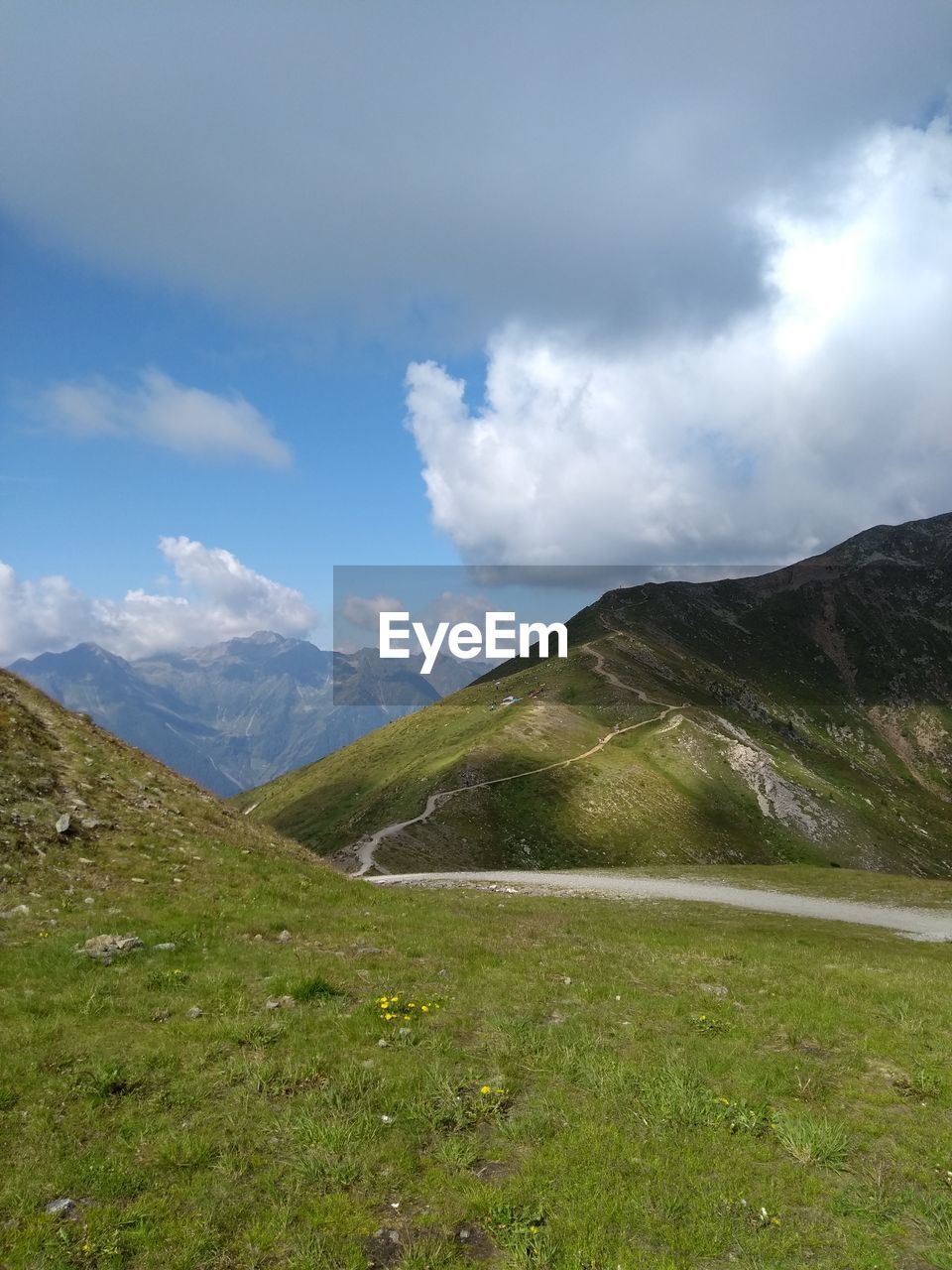 SCENIC VIEW OF MOUNTAIN AGAINST SKY