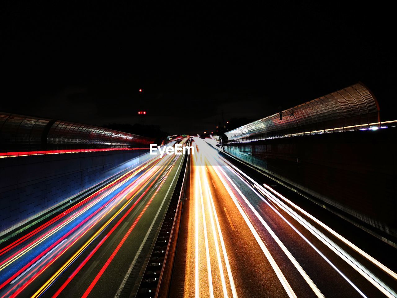 Light trails on road at night