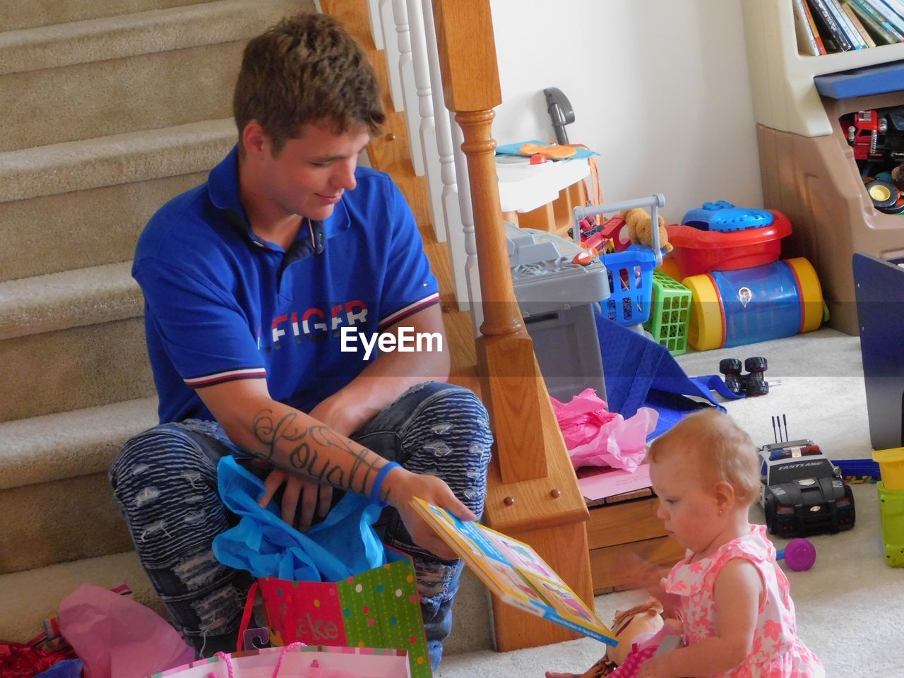 CHILDREN PLAYING IN BEDROOM