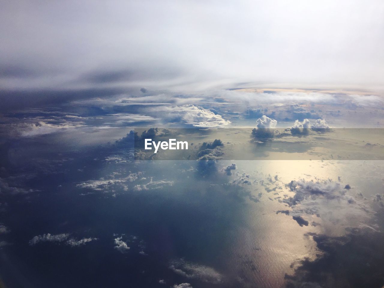 Aerial view of frozen sea against sky