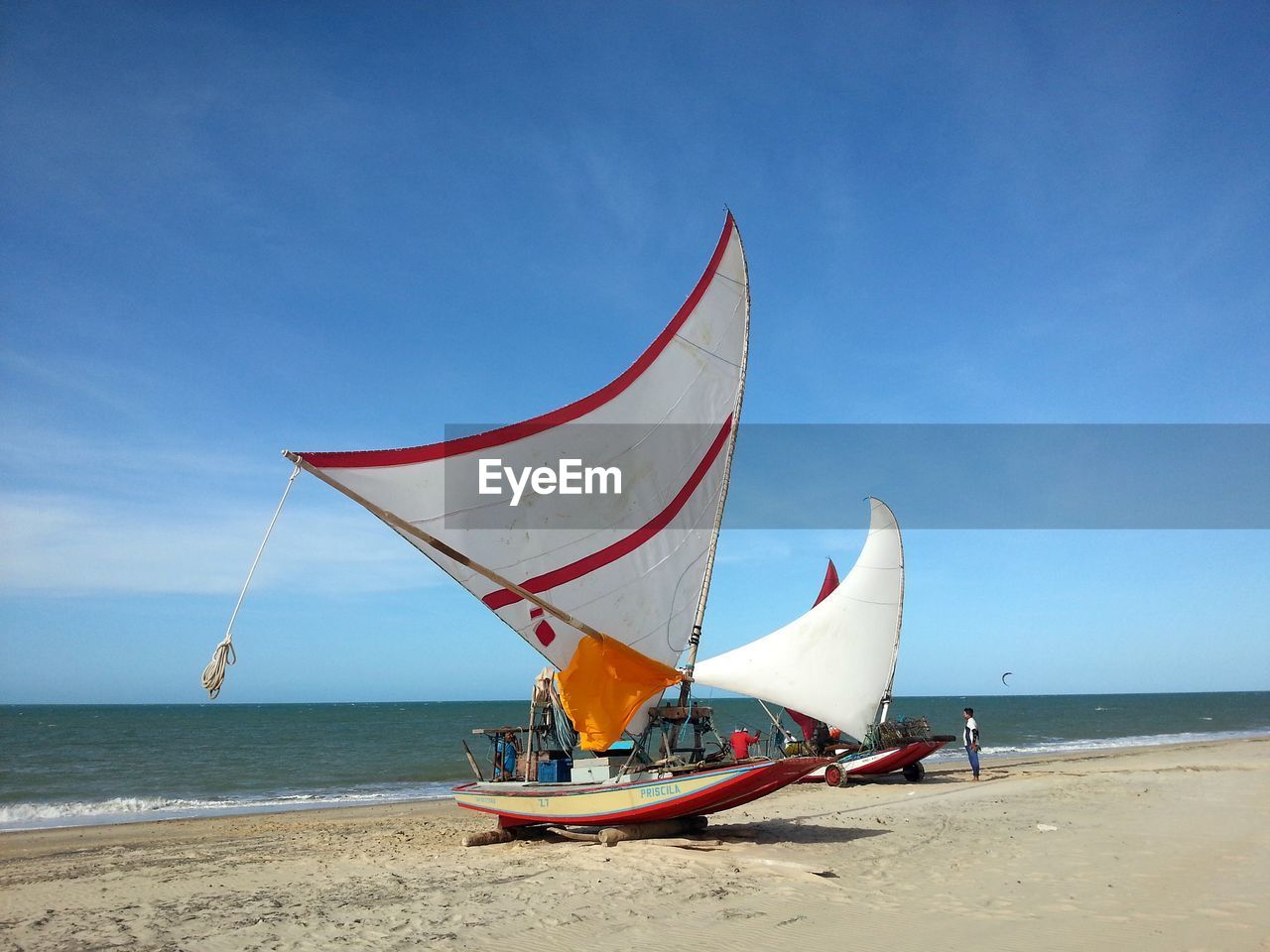 Traditional brazilian raft, jangadas, on beach against sky