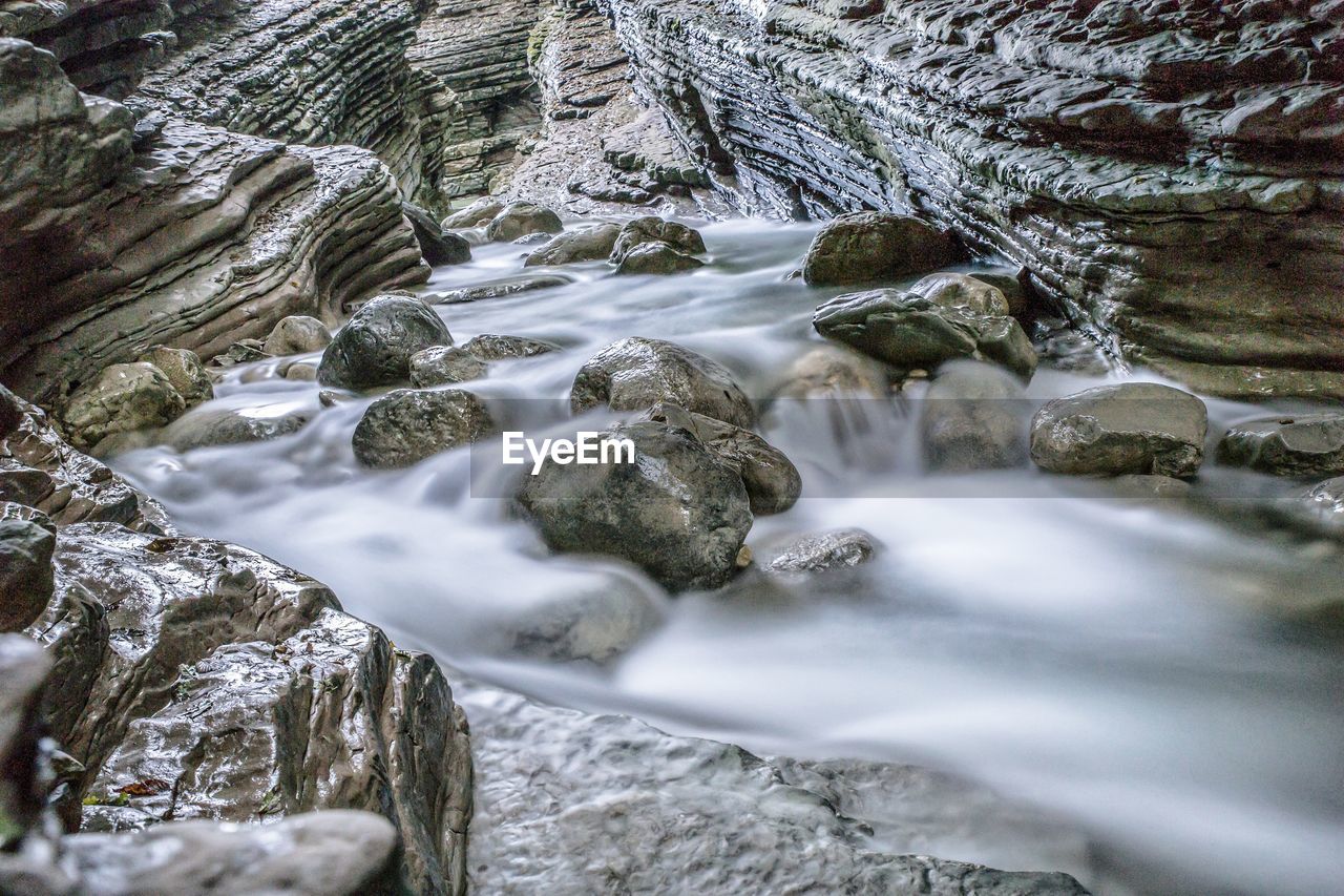 Long exposure of stream amidst rocks