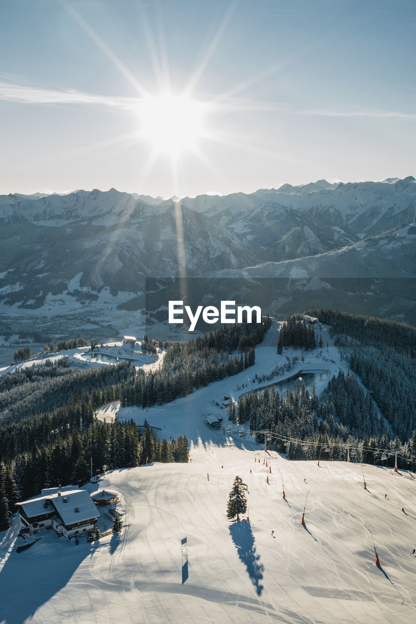 Aerial image of people skiing on piste, zell am see, austria