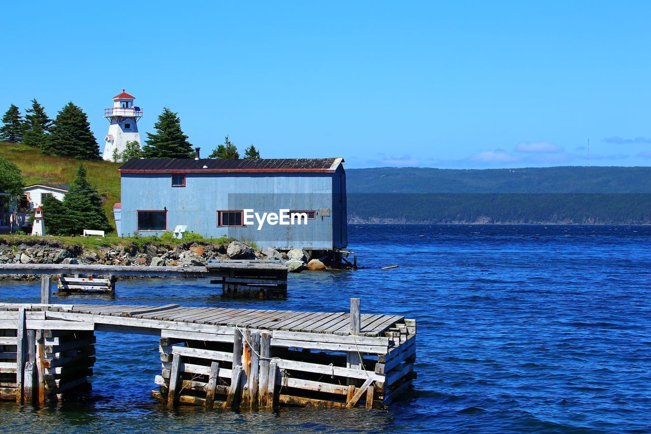 BUILT STRUCTURE ON SEA AGAINST CLEAR SKY