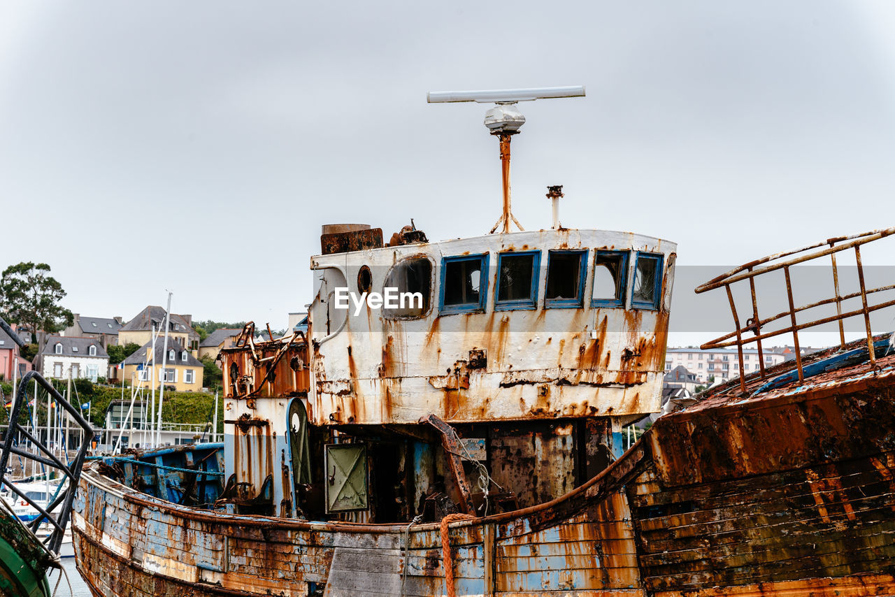 DAMAGED SHIP AGAINST SKY