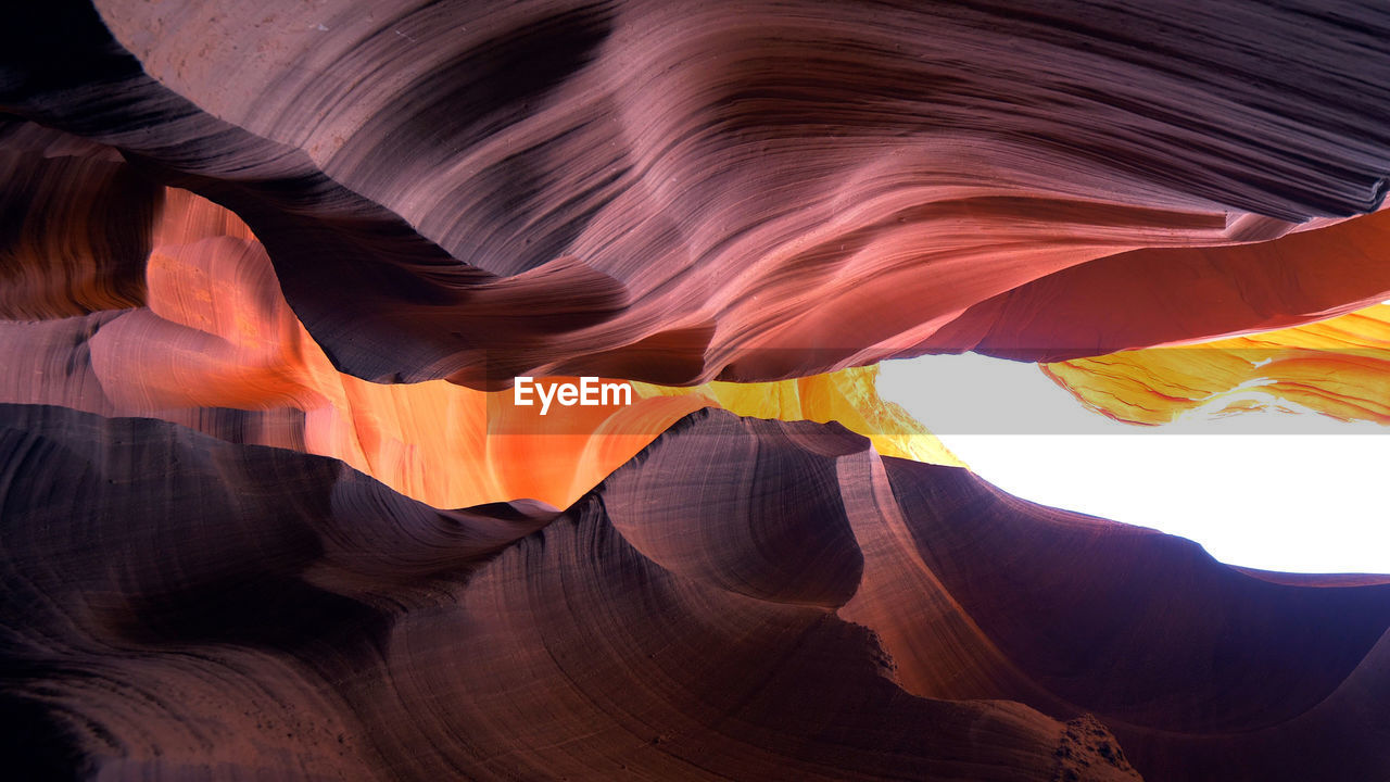 LOW ANGLE VIEW OF ROCK FORMATION IN A CANYON