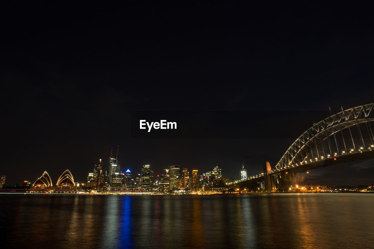 Sydney city at night with beautiful light and reflection.sydney opera house.long exposure shot.