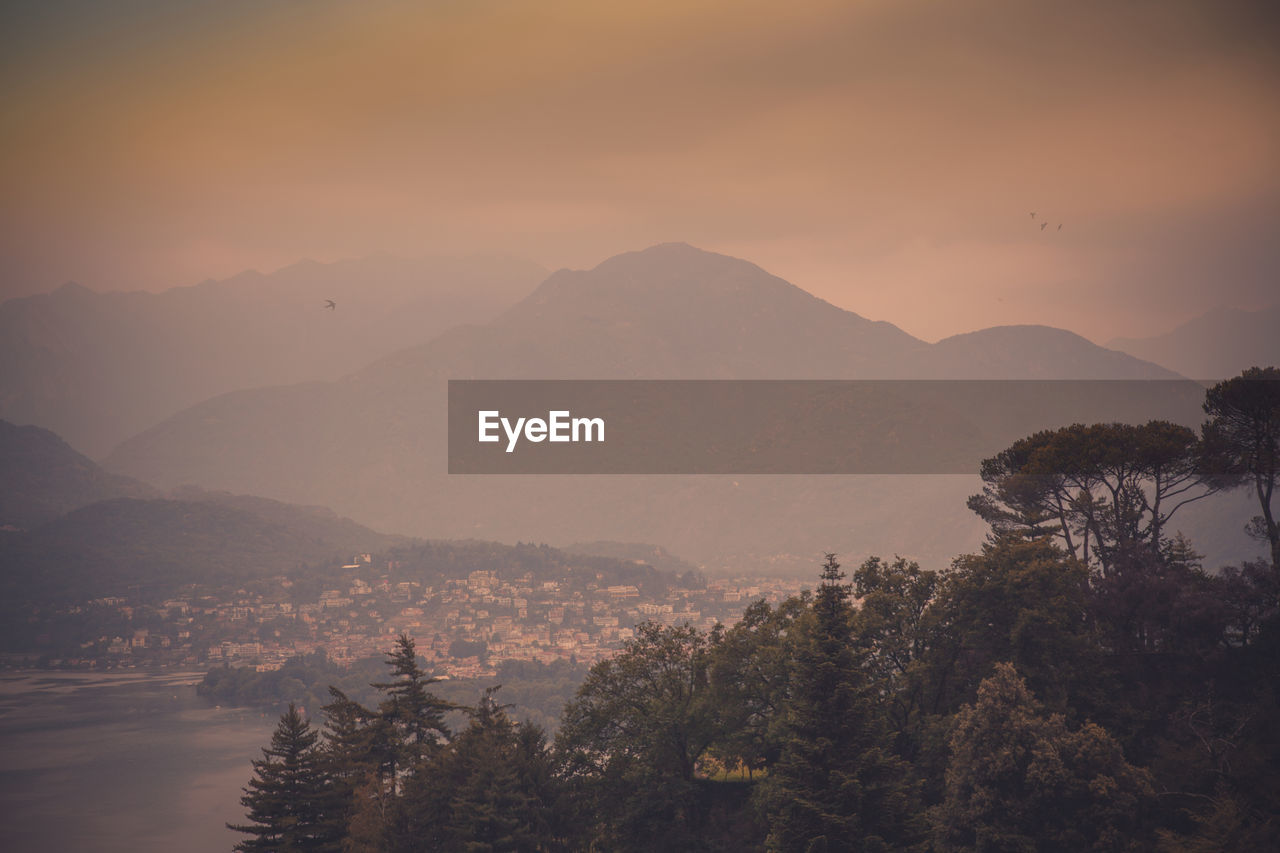 High angle view of mountains against sky during sunset