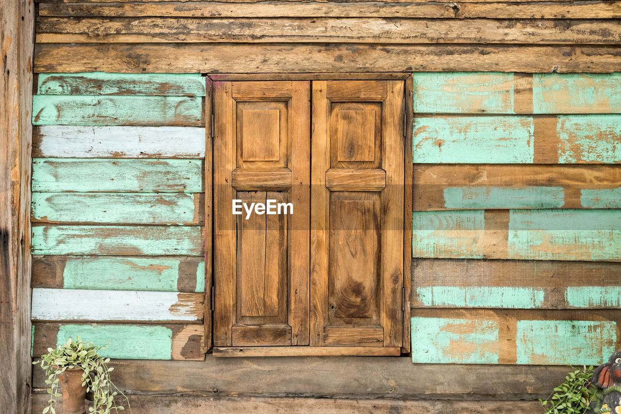 Wooden window on wall