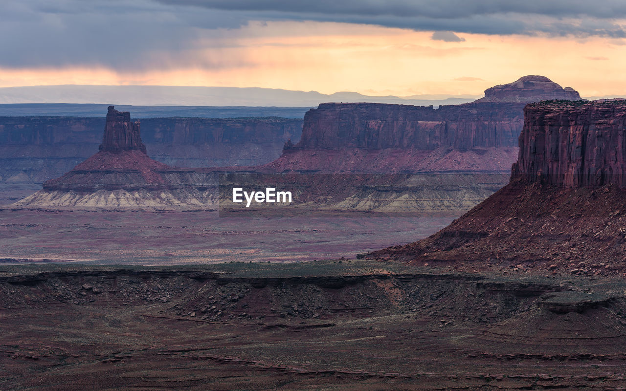 Scenic view of landscape against sky during sunset