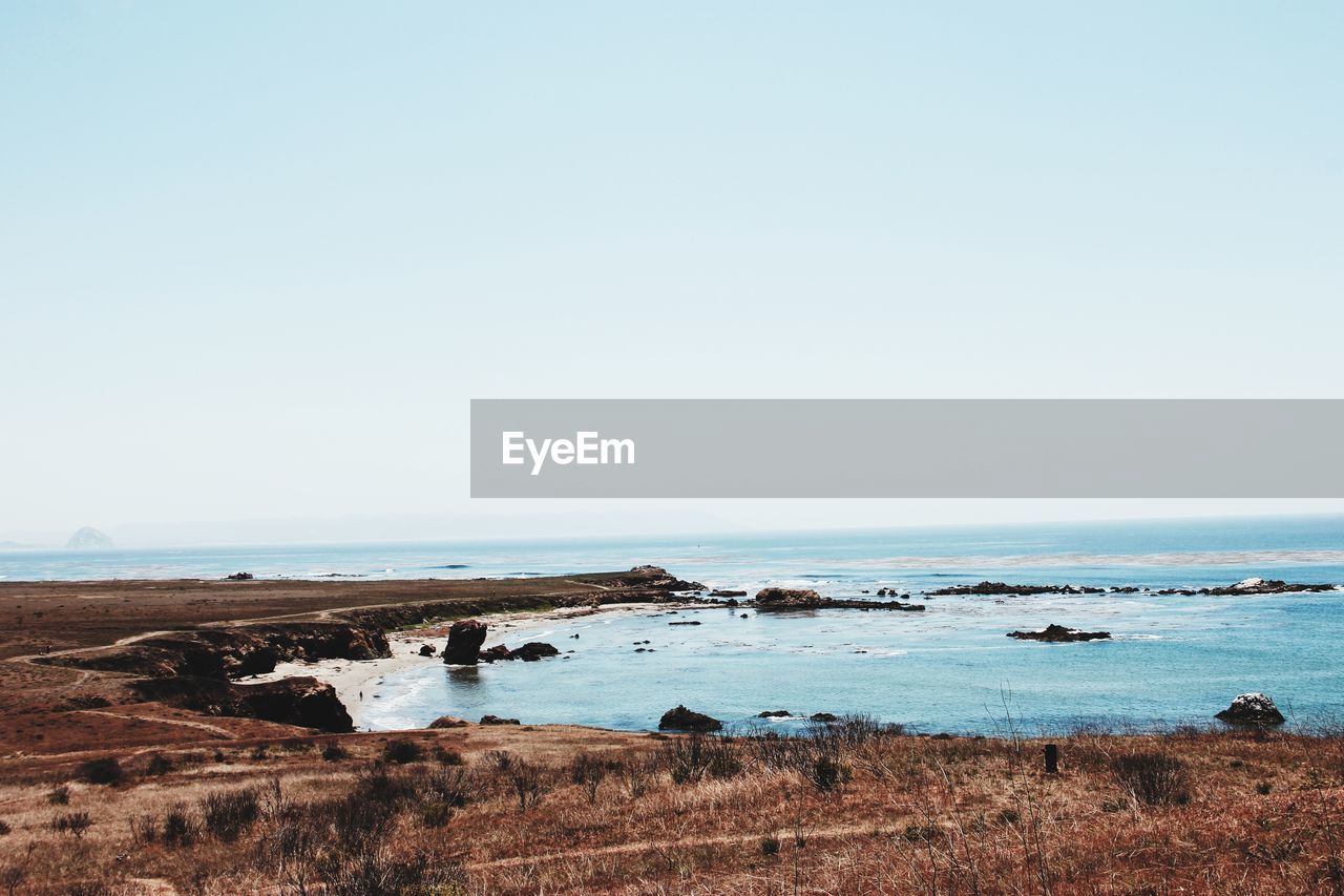 Scenic view of sea against clear sky