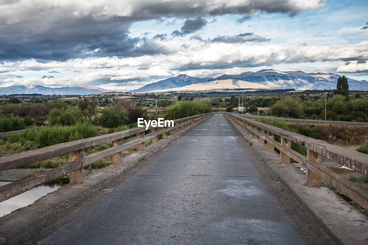 Road amidst landscape against sky