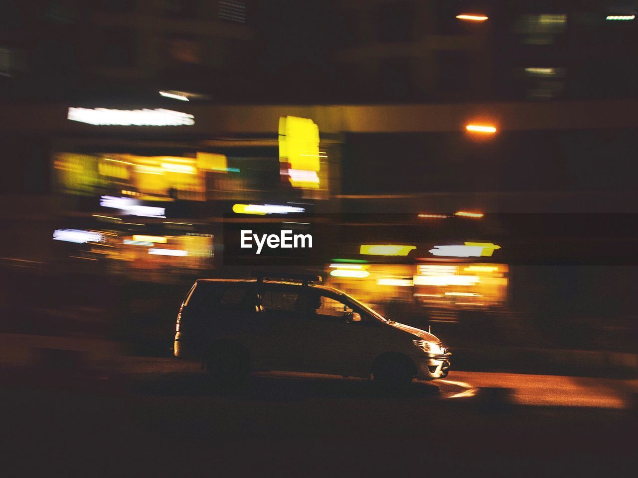 View of car in motion at night