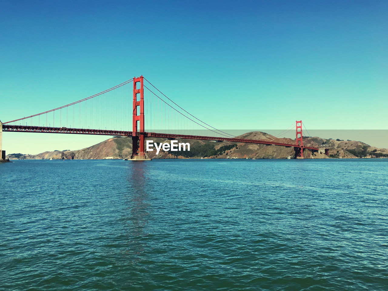 View of suspension bridge over sea