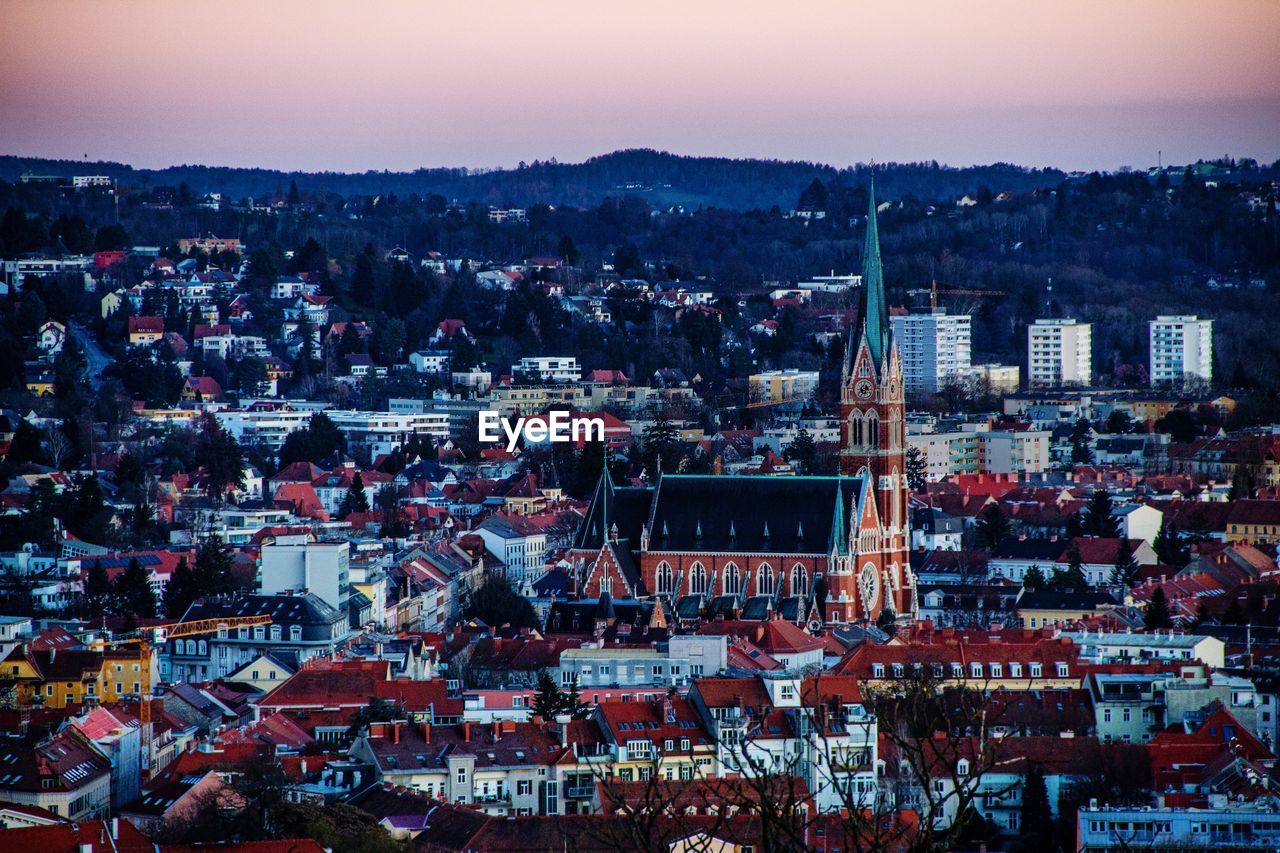 High angle view of townscape against sky at dusk