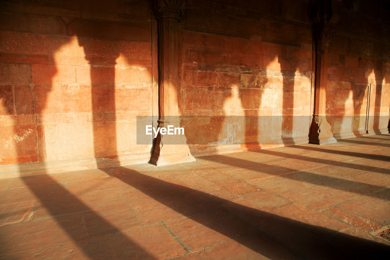 Sunlight falling on wall of red fort