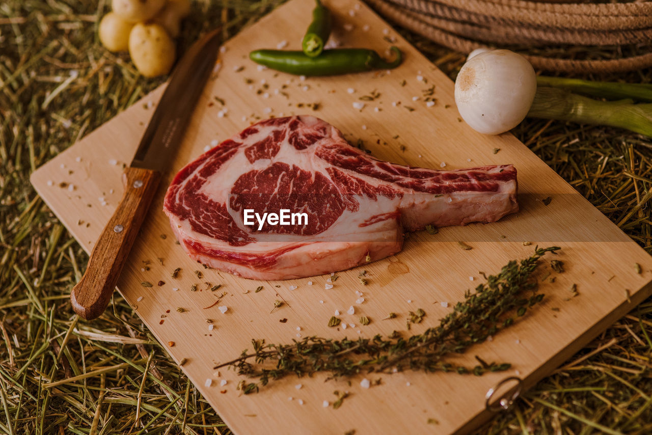 Close-up of meat on cutting board