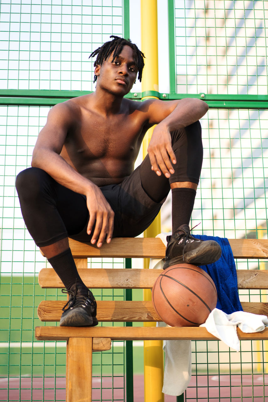 Portrait of the black man with the basketball