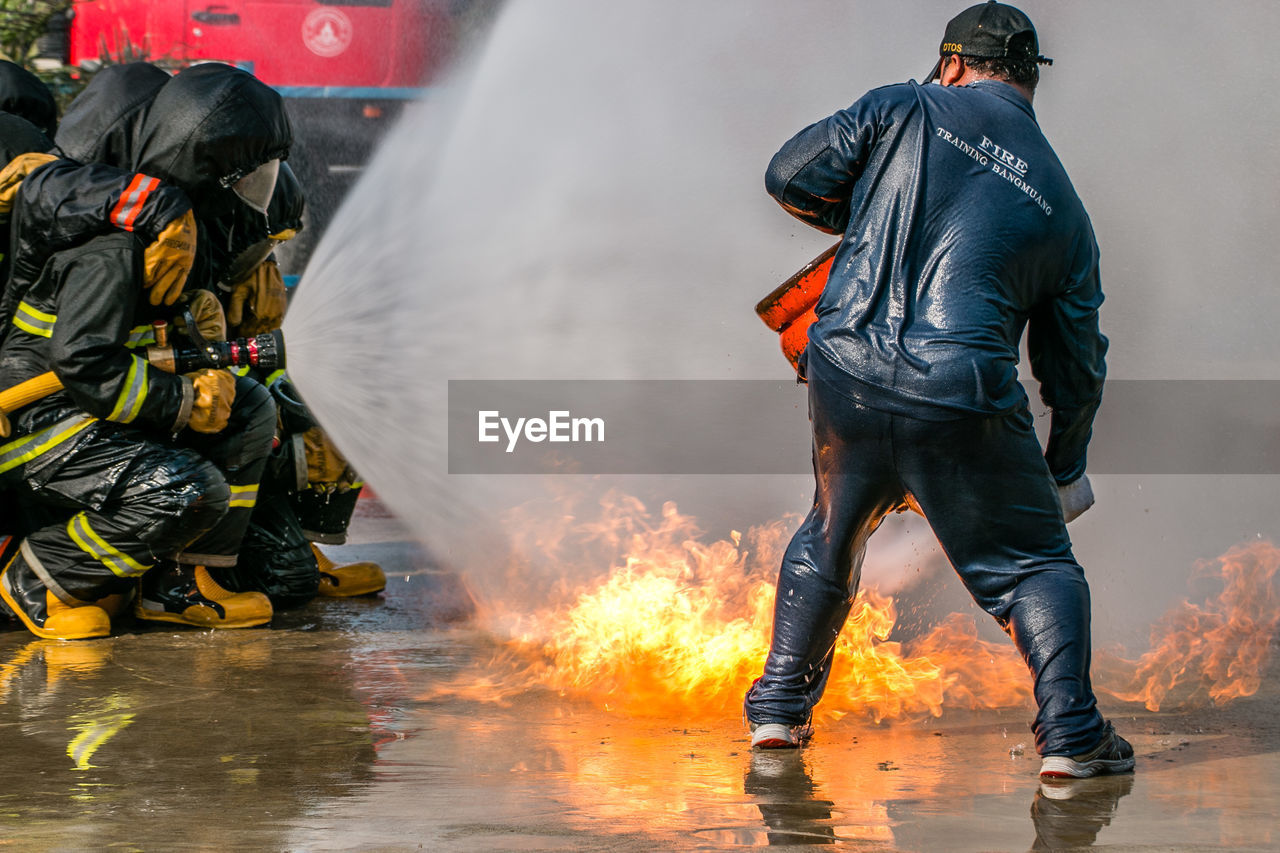 Firefighters extinguishing fire