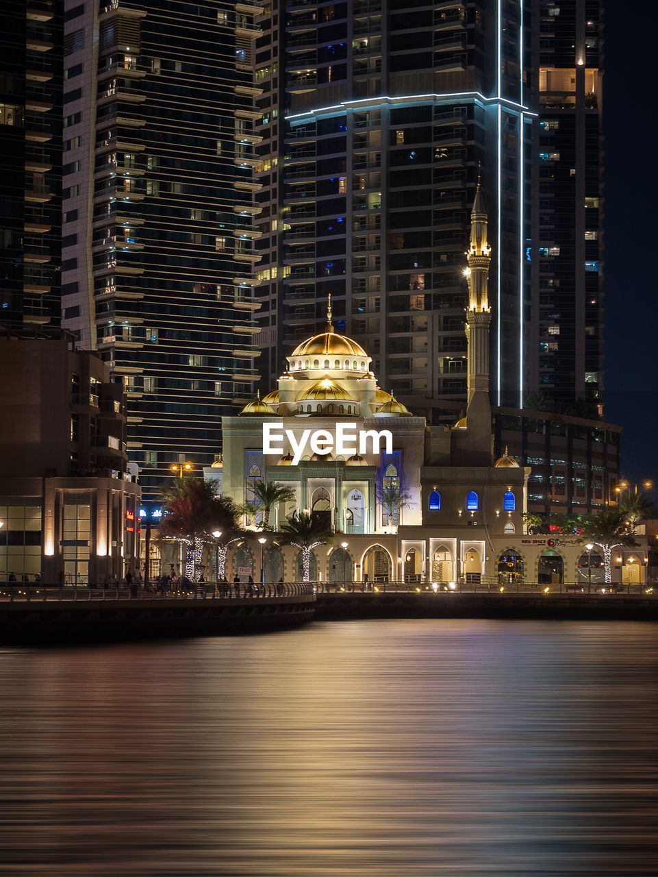 ILLUMINATED BUILDINGS AT NIGHT