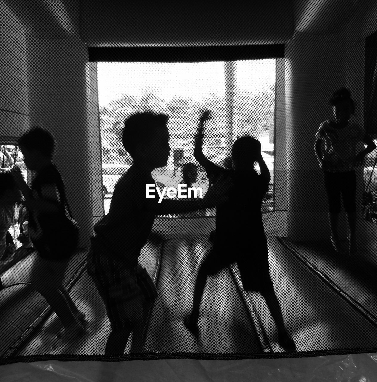 WOMAN IN BACKGROUND