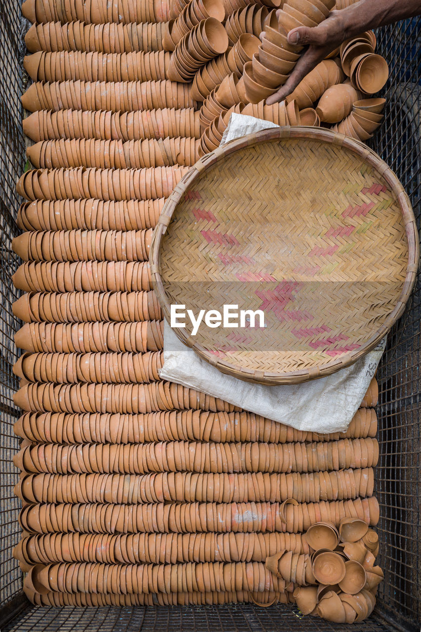 Directly above shot of diyas in container