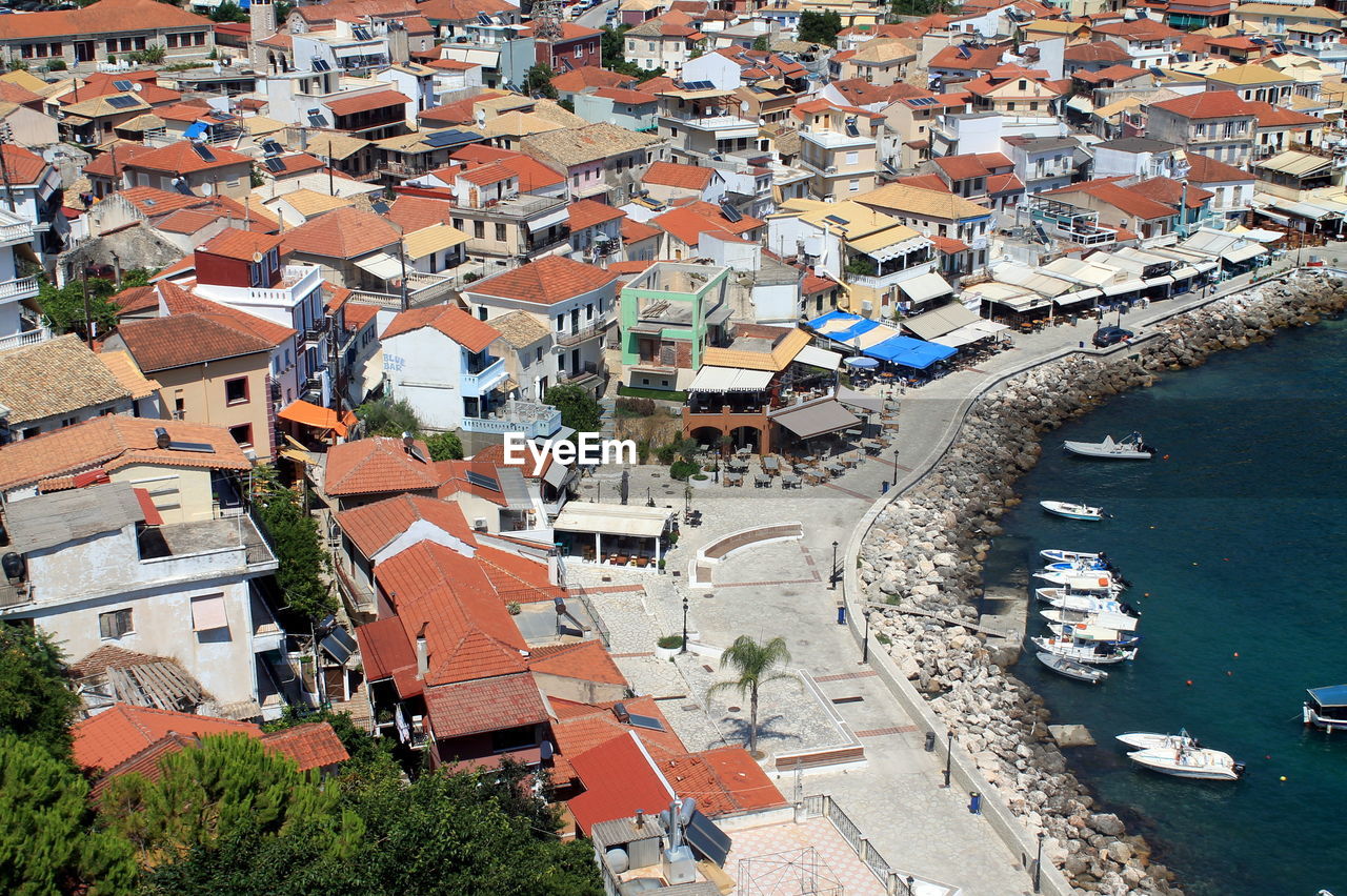 High angle view of townscape by lake