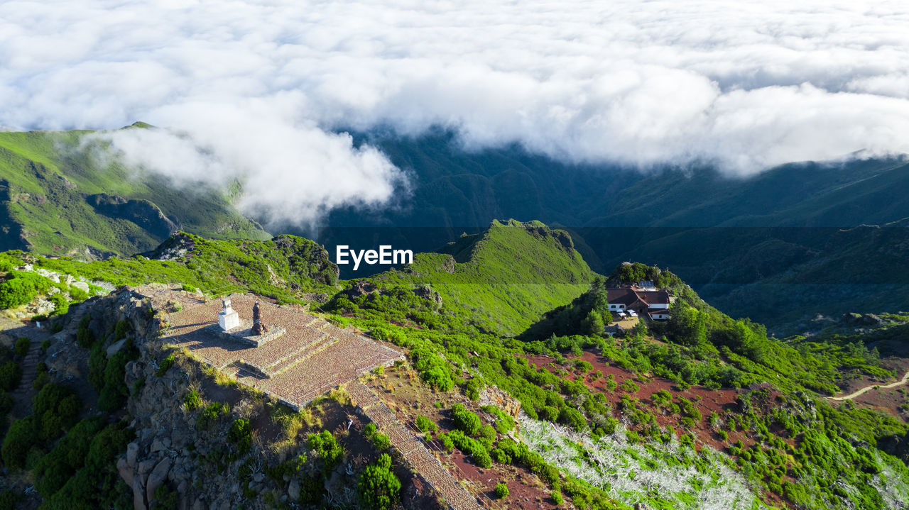 Aerial view of pico ruivo house on a sunny day in santana, madeira island, portugal