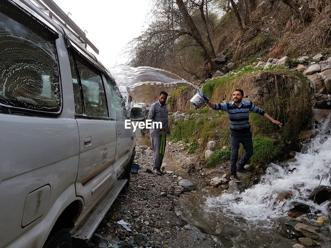 FULL LENGTH OF REAR VIEW OF CHILDREN ON CAR