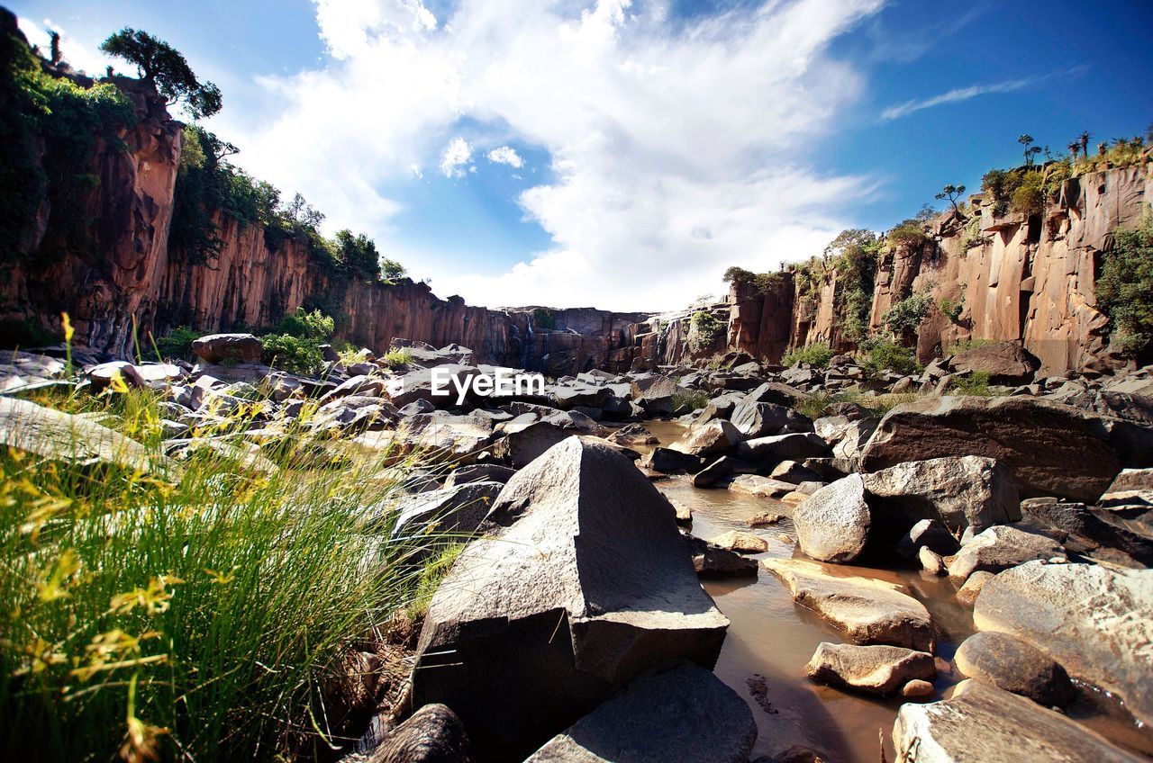 Panoramic view of rocks against sky