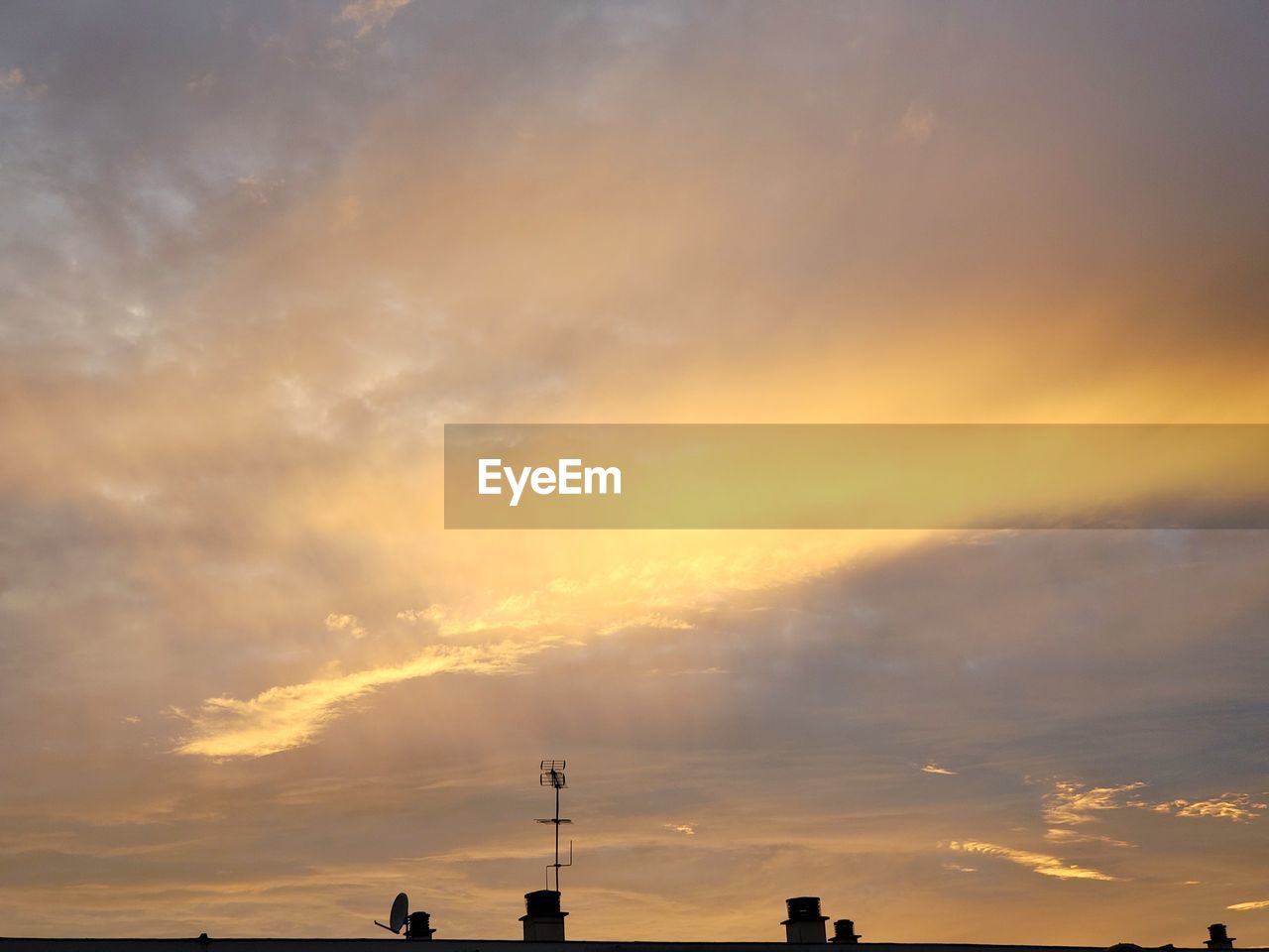 Low angle view of dramatic sky during sunset