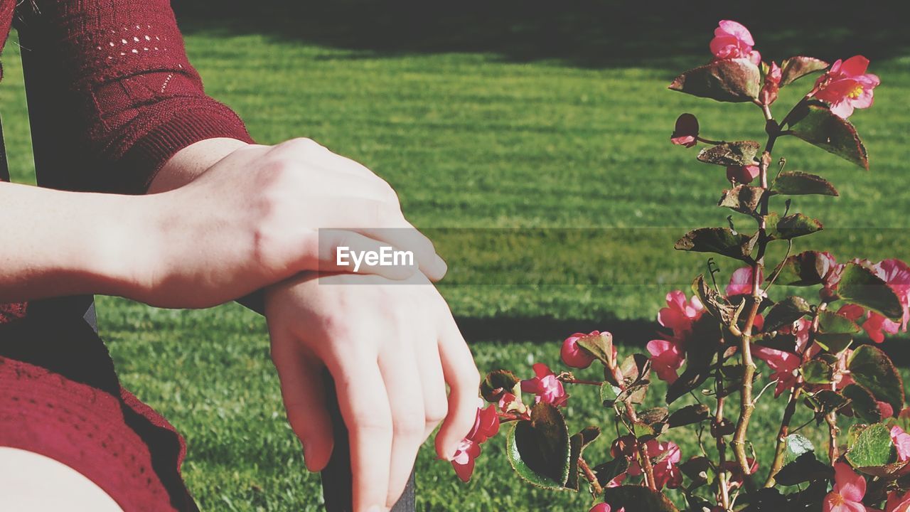 Close-up of womans's hands outdoors