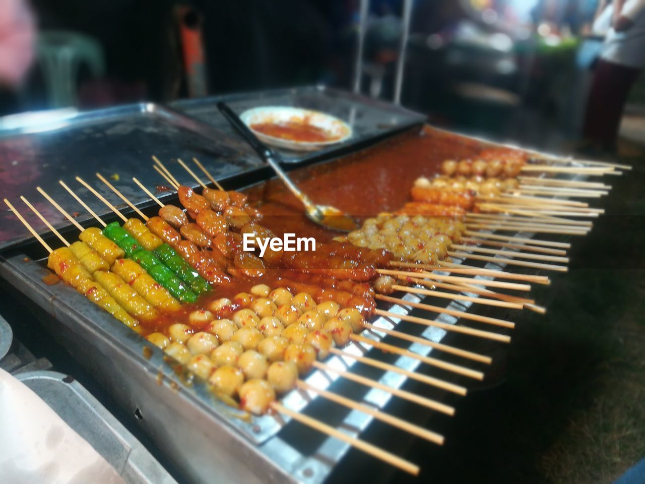 CLOSE-UP OF MEAT IN BARBECUE GRILL